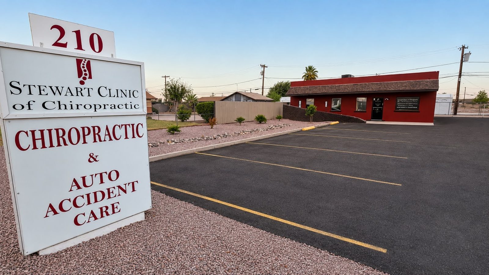 Stewart Clinic of Chiropractic sign reading Chiropractic and Auto Accident Care