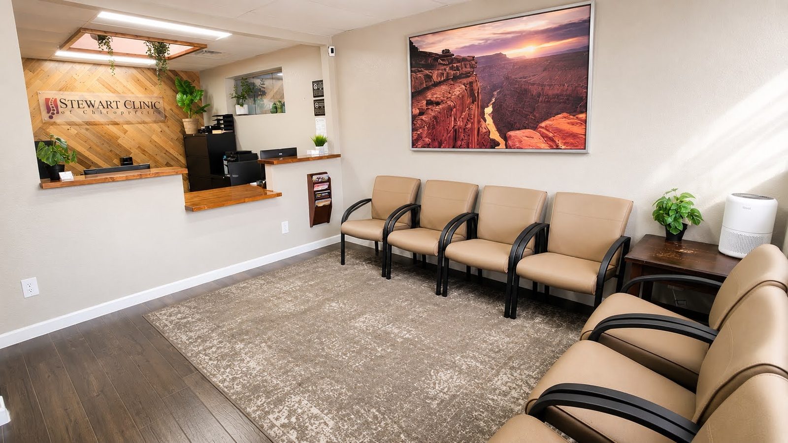 Front desk and waiting area at Stewart Clinic of Chiropractic